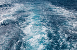 Boat Wave ocean trace on blue sea Red Sea Seashore Egypt background.