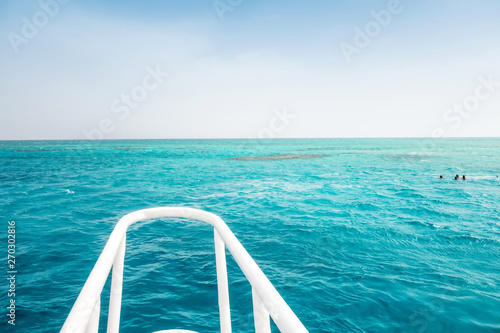 Boat Wave ocean trace on blue sea fresh water background. © Emoji Smileys People