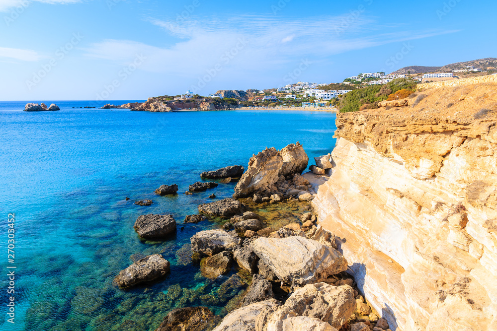 Rocks and azure sea in beautiful bay on Karpathos island in Ammopi village, Greece