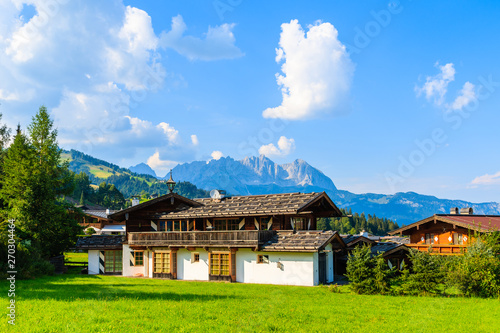 Wallpaper Mural Typical alpine house in countryside landscape near Kitzbuhel town, Tirol, Austria Torontodigital.ca