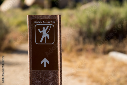 A rock climbing sign for a trail in Joshua Tree National Park. 