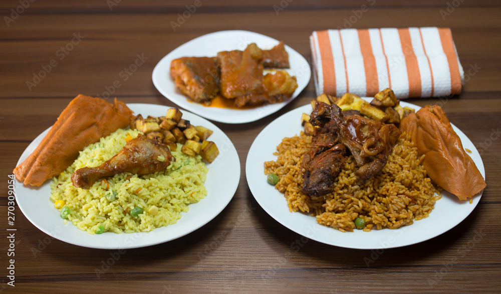 fried rice, jollof rice and moi moi fried rice, jollof rice and moi moi