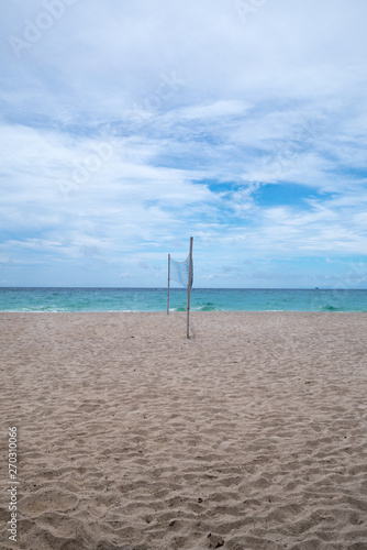 A volleyball net on a beach