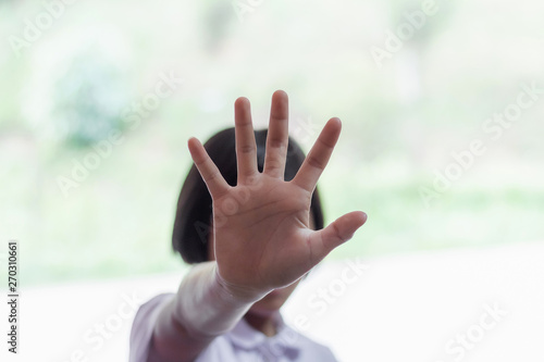 girl showing hand for stop violence and abuse women