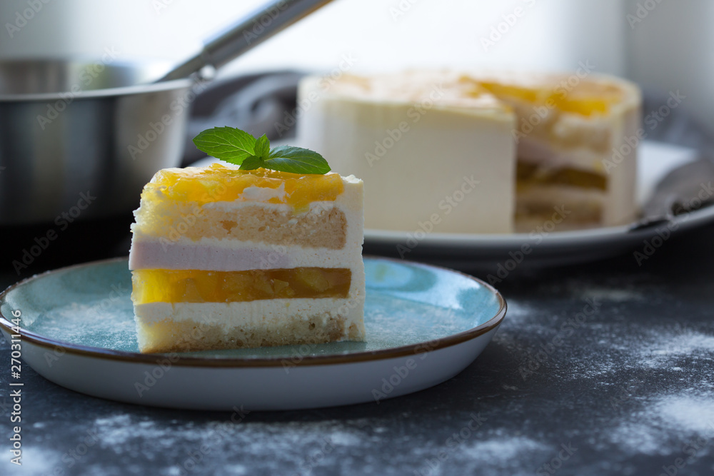 Mango fruit Mousse Cake, decorated with fresh fruits in jelly. Whipped cheese with biscuits Mango fruit Mousse Cake, decorated with fresh fruits in jelly. Whipped cheese with biscuits