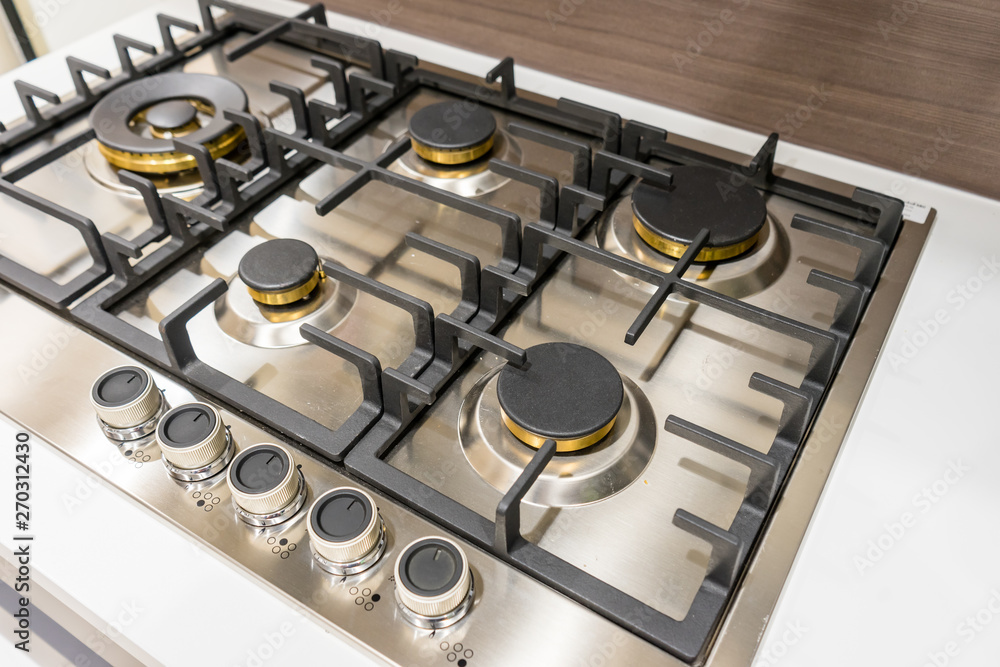 Gas burner in modern kitchen stove cook at home. Domestic gas
