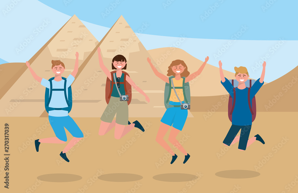 Fototapeta premium women and men jumping with backpack and camera