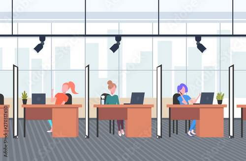 girls coworkers in creative office women operators sitting at workplace desks call center concept co-working open space interior flat horizontal full length
