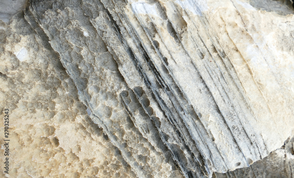 Texture of natural stone. Modern background. Image. Design for poster. Abstract backdrop. Black, grey, biege, sepia. Hole on the surface. Patterns and textures of rocks in nature. Closeup detail stone Texture of natural stone. Modern background. Image. Design for poster. Abstract backdrop. Black, grey, biege, sepia. Hole on the surface. Patterns and textures of rocks in nature. Closeup detail stone