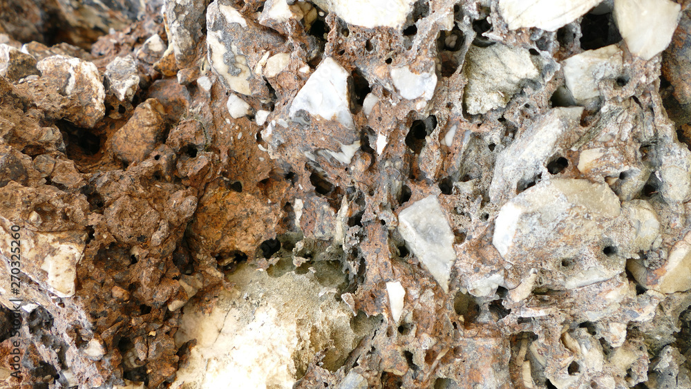 Texture of natural stone. Modern background. Image. Design for poster. Abstract backdrop. Black, grey, biege, sepia. Hole on the surface. Patterns and textures of rocks in nature. Closeup detail stone Texture of natural stone. Modern background. Image. Design for poster. Abstract backdrop. Black, grey, biege, sepia. Hole on the surface. Patterns and textures of rocks in nature. Closeup detail stone