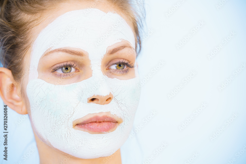 Girl with dry white mud mask on face Girl with dry white mud mask on face