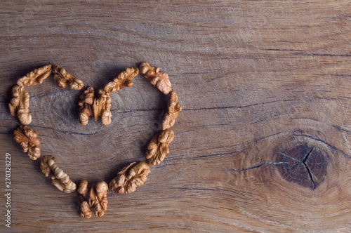 brown heart of walnut on a wooden oak board