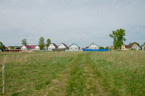 landscape the village in the spring to Siberia Russia