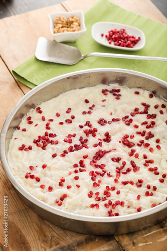 Traditional milky dessert Gullac,usually make in Ramadan with Gullac pomegranate seeds