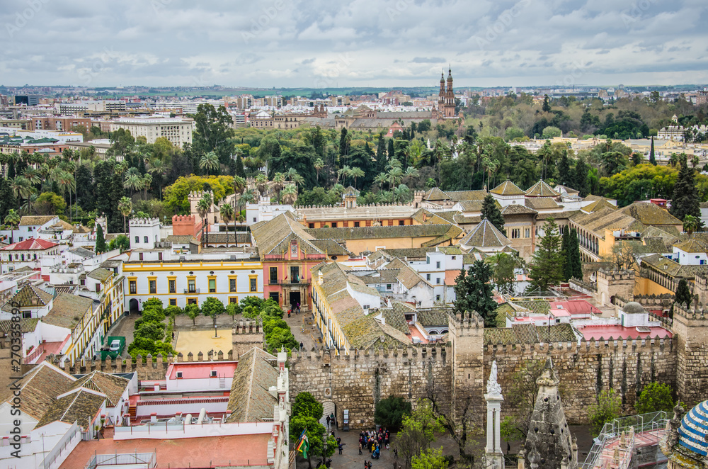Naklejka premium Aerial view of the Royal Alcazar of Seville and its gardens