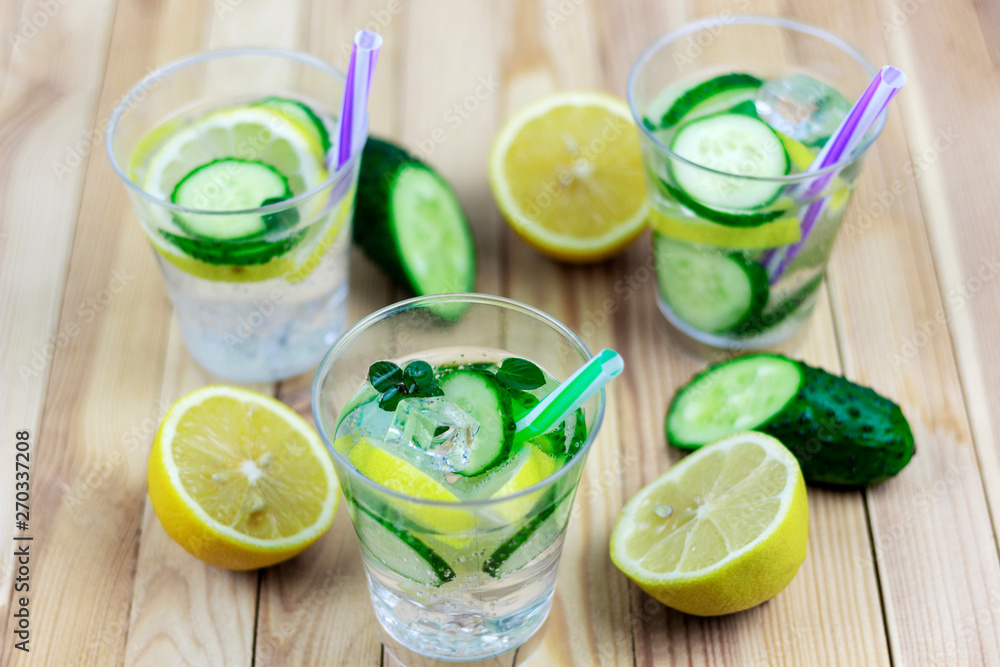 cold, refreshing cucumber water with lemon and mint. With ingredients cold, refreshing cucumber water with lemon and mint. With ingredients