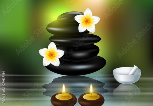 Spa concept zen stones and frangipani flowers