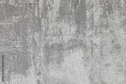 The texture of old concrete wall for background with a concrete splash on the...