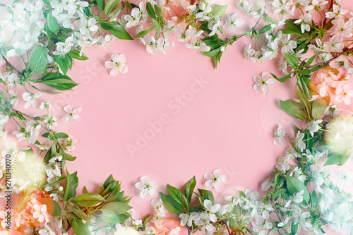 Spring blossom. Cherry flowers flat on pastel background. Greeting card with white flowers, bokeh , copy space © Maria Shchipakina