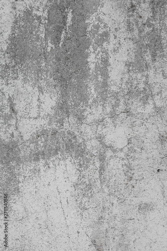 The texture of the old grey concrete wall with scratches, cracks, dust, crevi...
