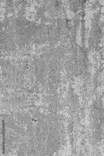 The texture of the old grey concrete wall with scratches, cracks, dust, crevi...