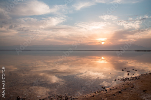 Sunrise above the Dead sea  beautiful reflections on the water