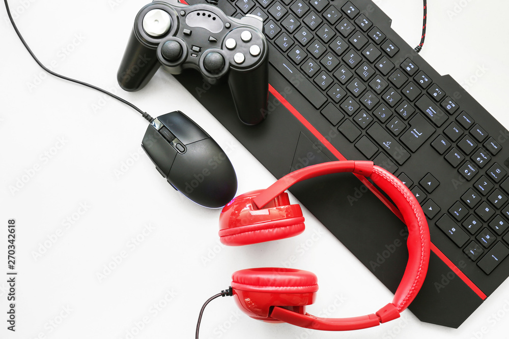 Modern gaming accessories on light background Modern gaming accessories on light background