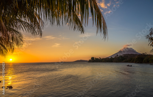 Photo View at the sunset with Conception Volcano at the Nicaragua lake in Ometepe Isla