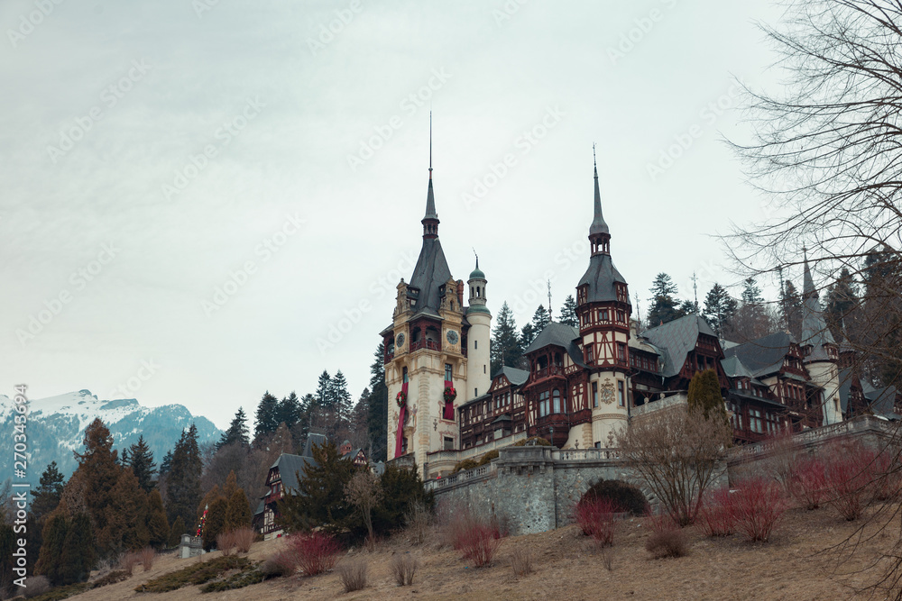Peles Castle. Neo-Renaissance castle in the Carpathian Mountains, near Sinaia, in Prahova County, Romania look from the garden