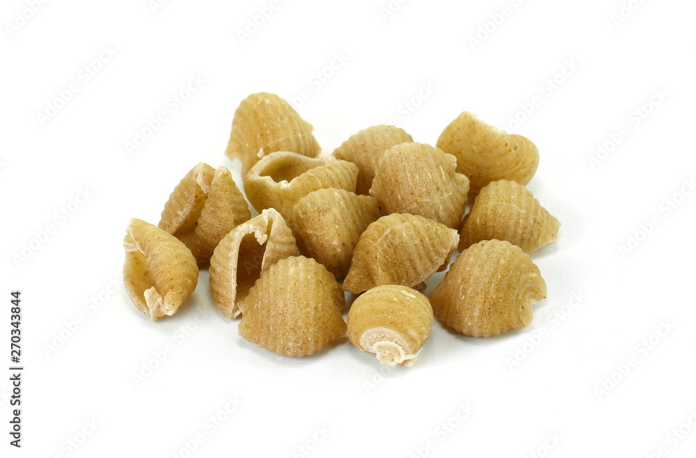 Wholemeal pasta on a white background Wholemeal pasta on a white background