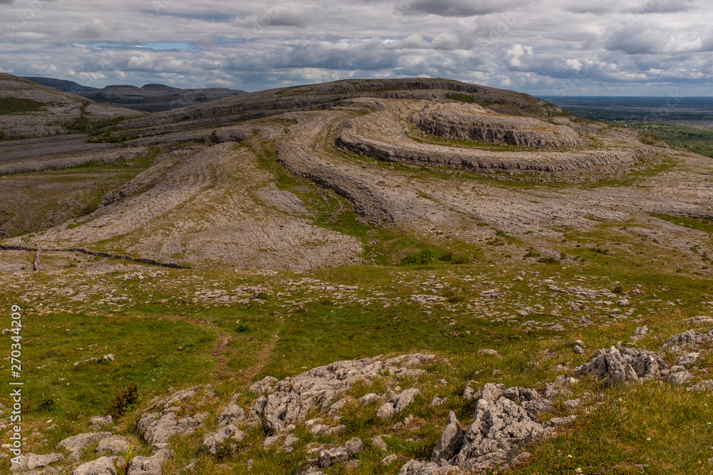 A view of unique Sliabh Rua, Red Mountain from Mullaghmore Mountain  in The Burren National Park nobody in the image
