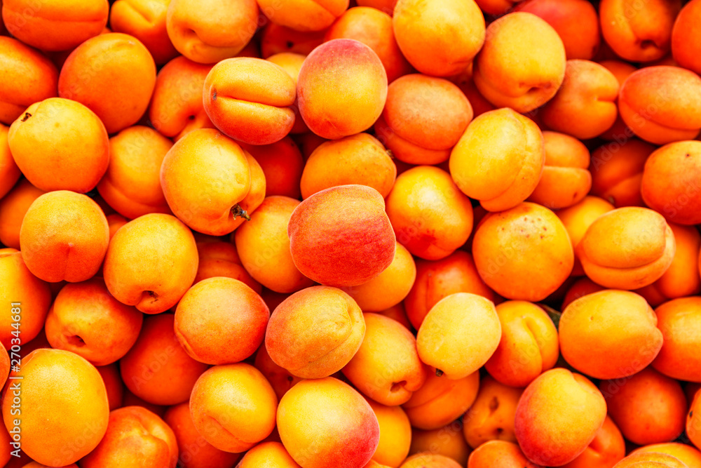 Ripe juicy apricots on the counter, close-up