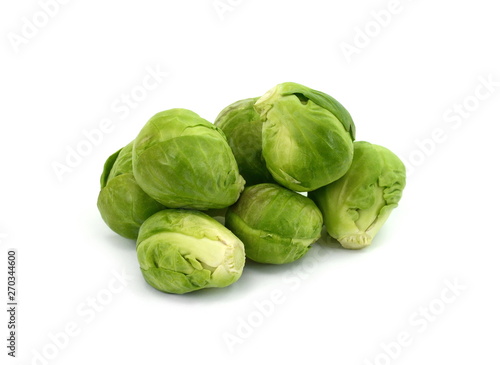 a pile of Brussels sprouts on a white background.