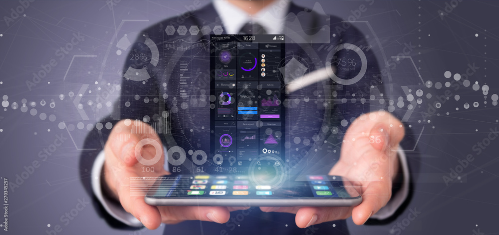 Businessman holding Smartphone with user interface data on the screen isolated on a background Businessman holding Smartphone with user interface data on the screen isolated on a background