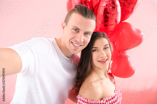 Happy young couple with air...