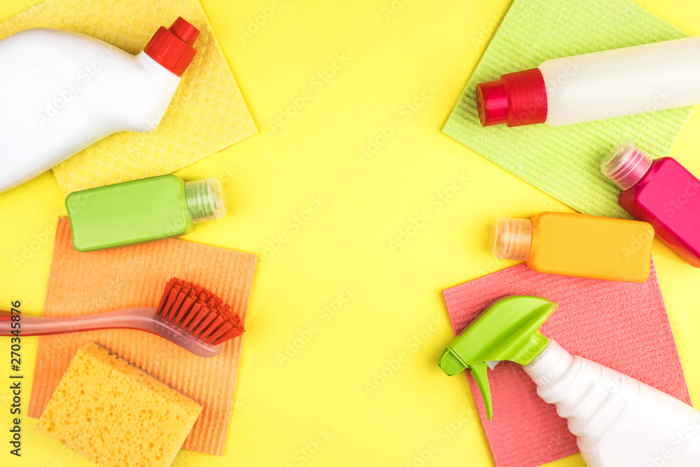 House cleaning products are on yellow background. House cleaning products are on yellow background.
