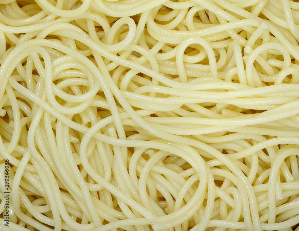 Spaghetti - Plain Italian spaghetti pasta background. Spaghetti - Plain Italian spaghetti pasta background.