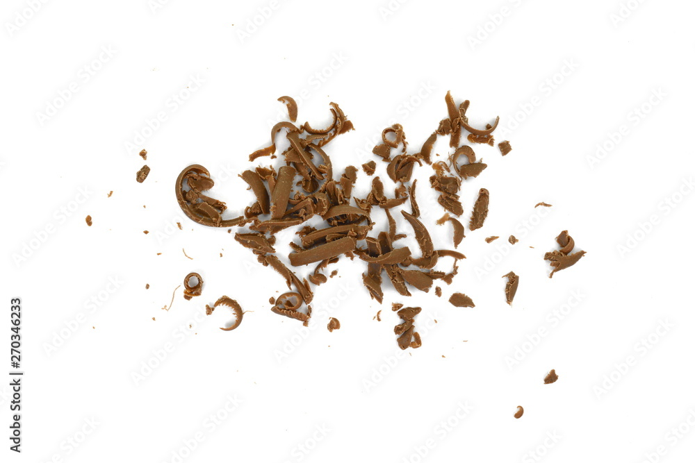 Grated chocolate. Heap of ground chocolate isolated on white background with clipping path, closeup.