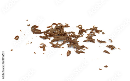 Grated chocolate. Heap of ground chocolate isolated on white background with clipping path, closeup.