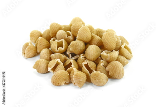 Wholemeal pasta on a white background 