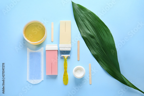 Set for hair removal on color background photo