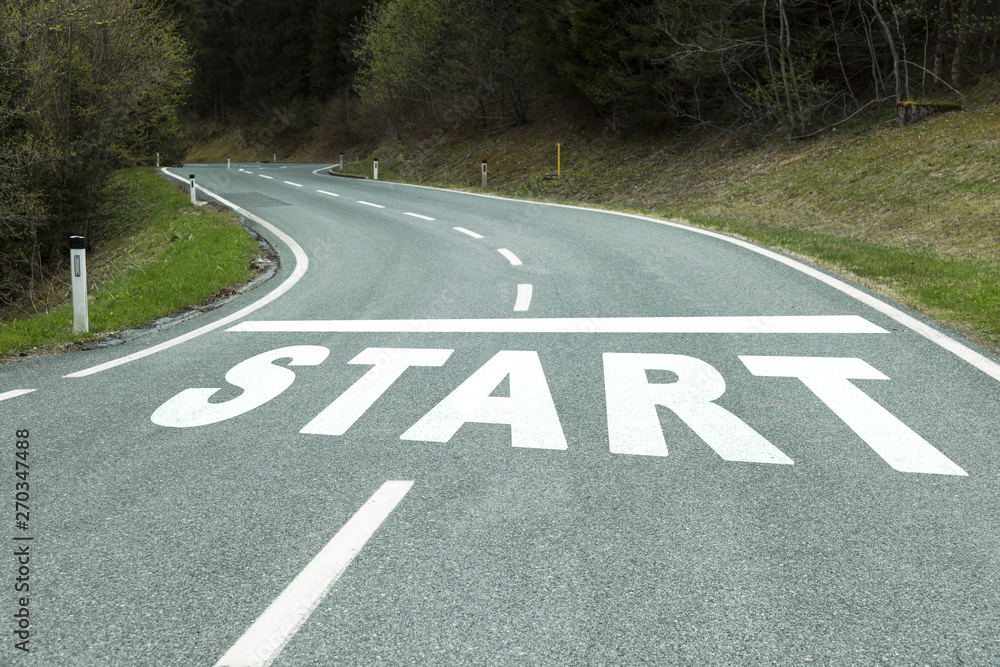 Fototapeta premium Start message on curvy countryside asphalt road