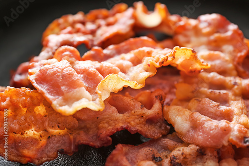 Tasty fried bacon, closeup view