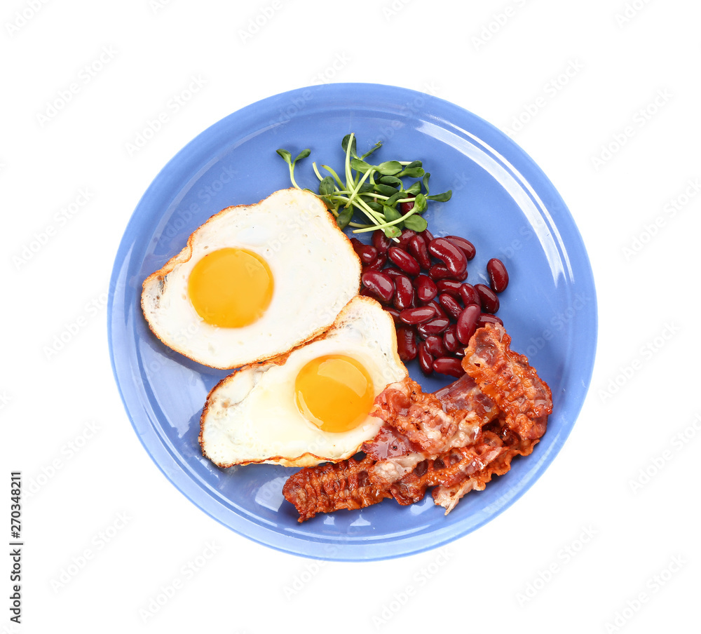 Plate with tasty fried eggs, bacon and beans on white background Plate with tasty fried eggs, bacon and beans on white background
