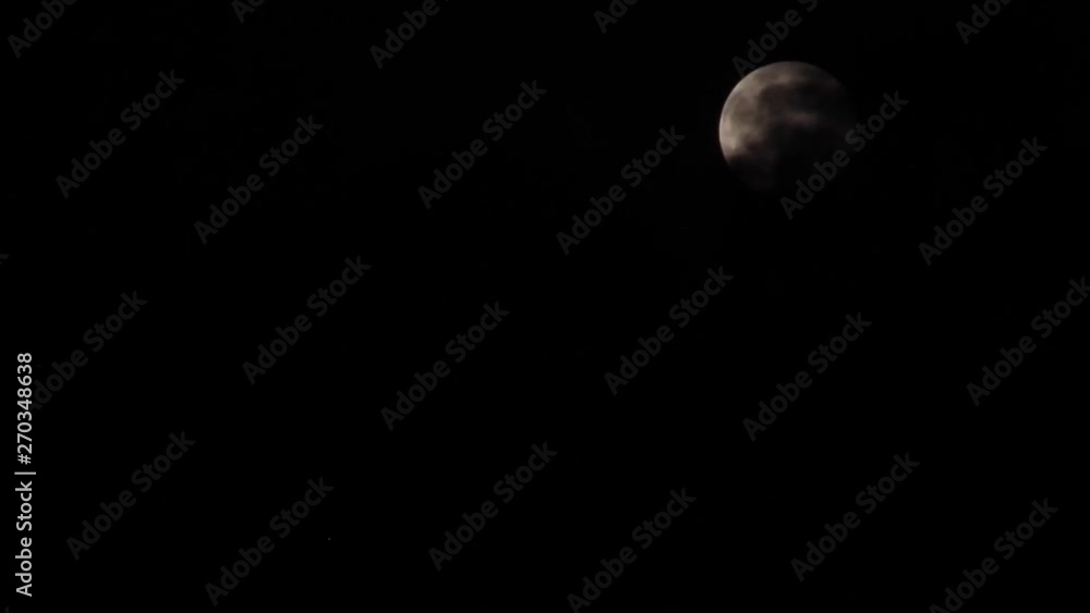 timelaps for the moon abscure with dark clouds timelaps for the moon abscure with dark clouds