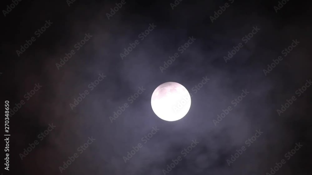 timelaps for the moon abscure with dark clouds timelaps for the moon abscure with dark clouds