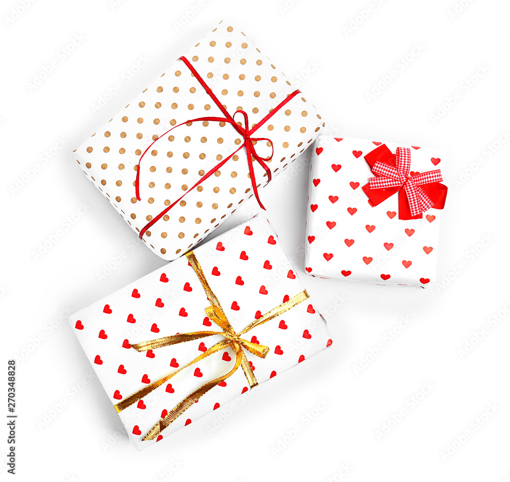 Fototapeta premium Beautiful gift boxes on white background