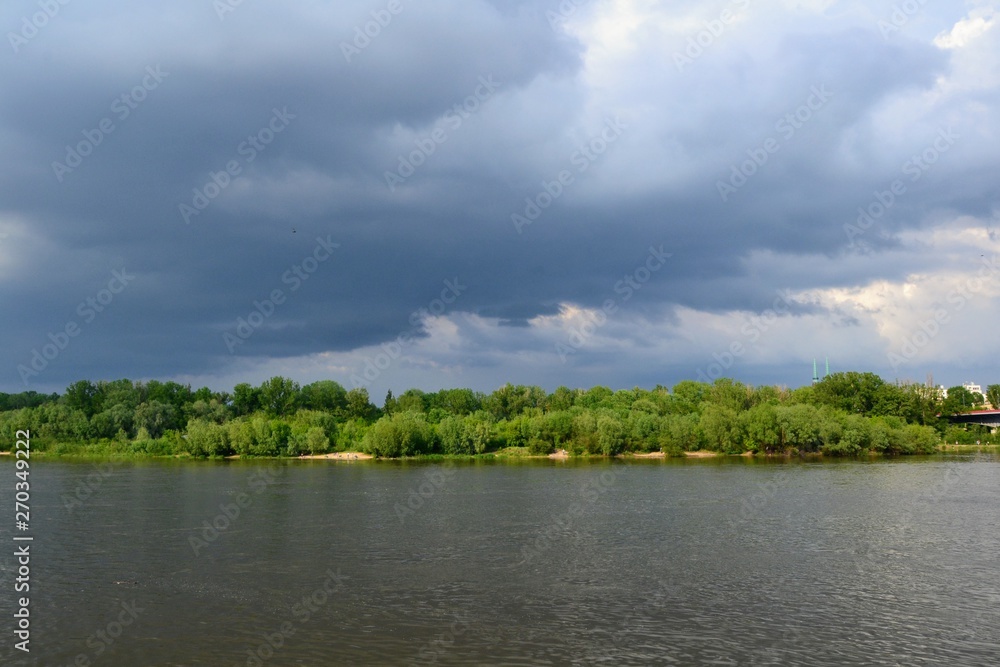 Dark storm clouds over the Vistula river, Warsaw, Poland Dark storm clouds over the Vistula river, Warsaw, Poland