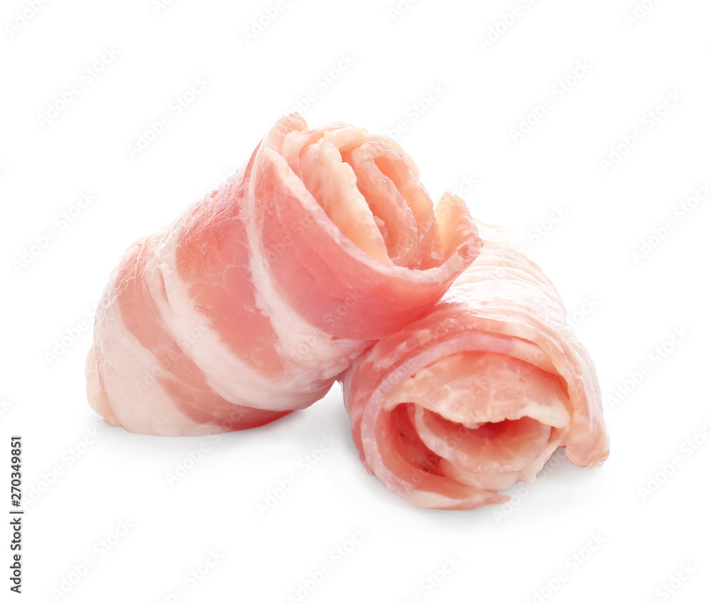 Raw bacon rolls on white background