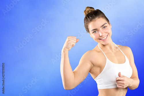 Fitness woman. Young sporty Caucasian female model isolated